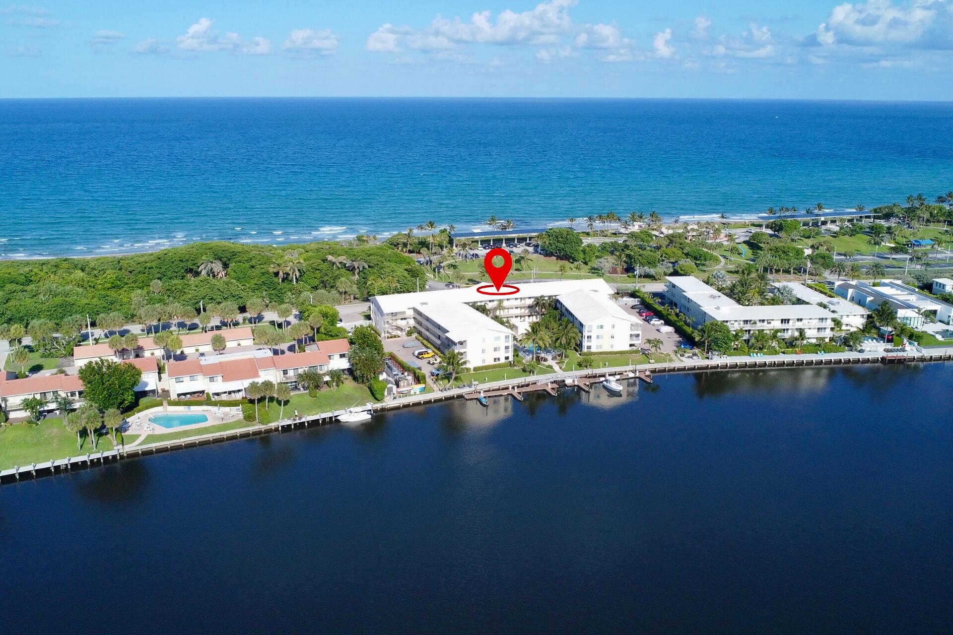 6530 North Ocean Boulevard, Unit 205 Ocean Ridge, FL 33435 - Photo 45 of 53 an aerial view of ocean and residential houses with outdoor space