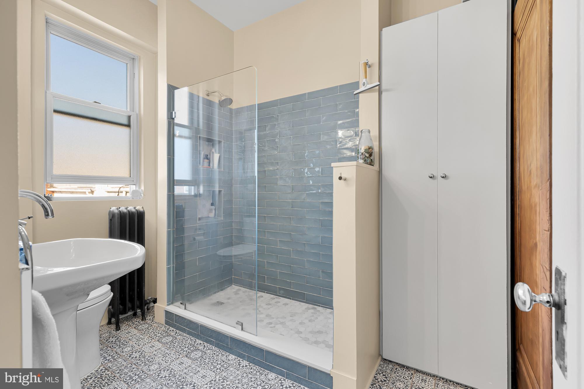 1860 California Street Northwest, Unit 403 Washington, DC 20009 - Photo 14 of 52 Updated bathroom w marble shower floor