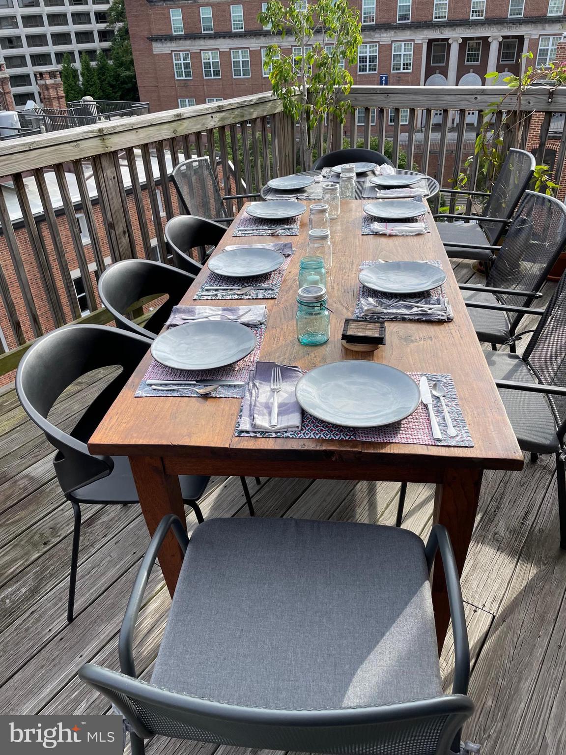 1860 California Street Northwest, Unit 403 Washington, DC 20009 - Photo 50 of 52 Dining al fresco on the deck on a warm evening