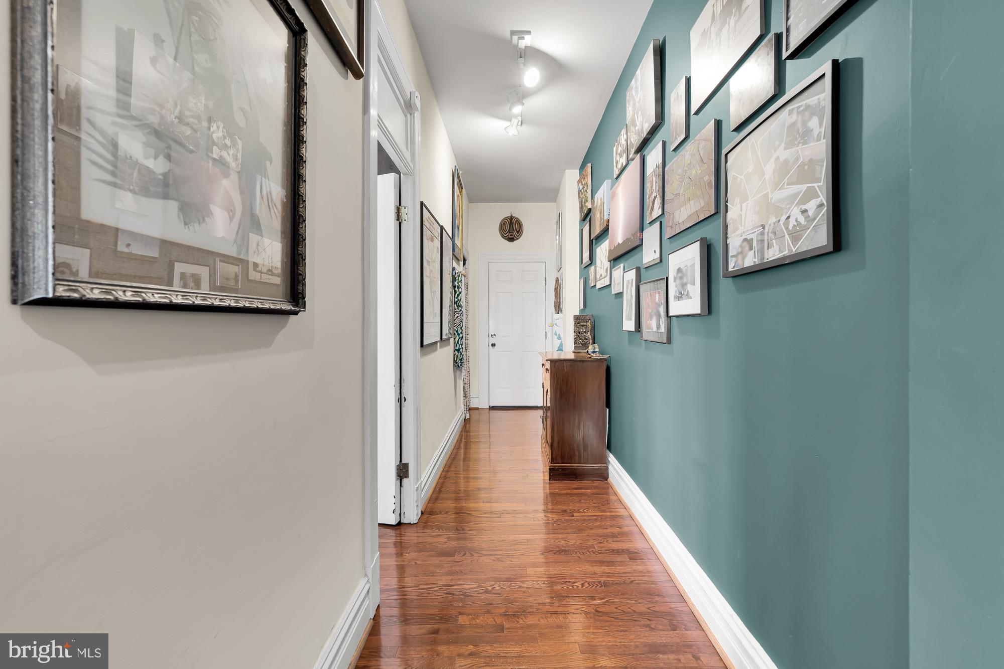 1860 California Street Northwest, Unit 403 Washington, DC 20009 - Photo 6 of 52 Gallery wall from dining area