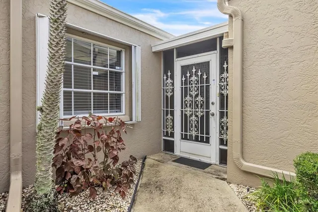a view of a bathroom with a glass door