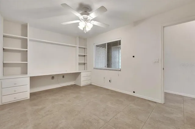 an aerial view of a city with lake view