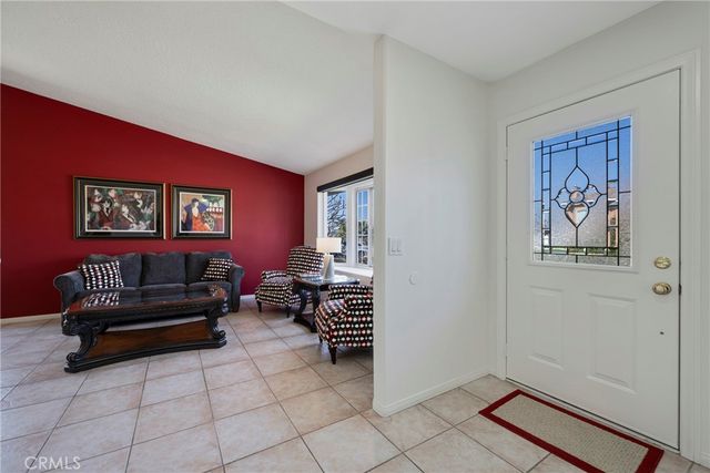 a living room with furniture and a gate