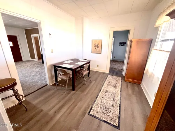 a living room with furniture and a rug