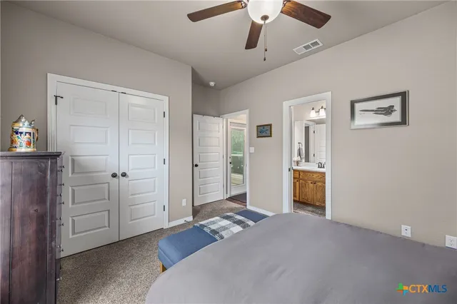 a bathroom with a double vanity sink mirror and double