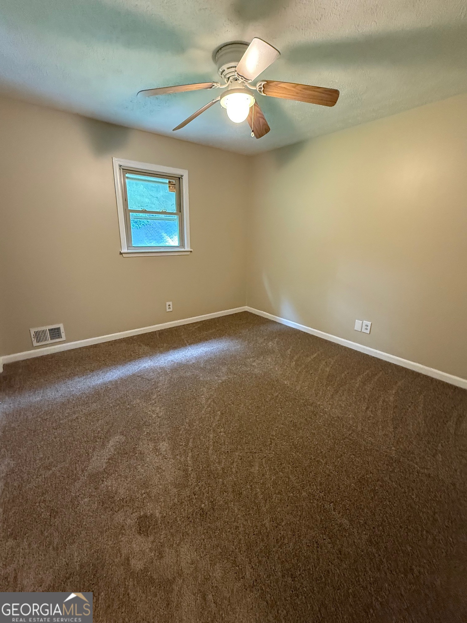 2691 Falcon Ridge Drive Southwest Grayson, GA 30017 - Photo 7 of 10 a view of an empty room
