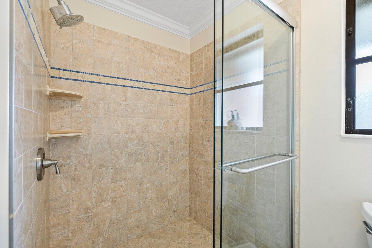 18779 Southeast River Ridge Road Tequesta, FL 33469 - Photo 23 of 62 1st Floor Primary Bath Shower