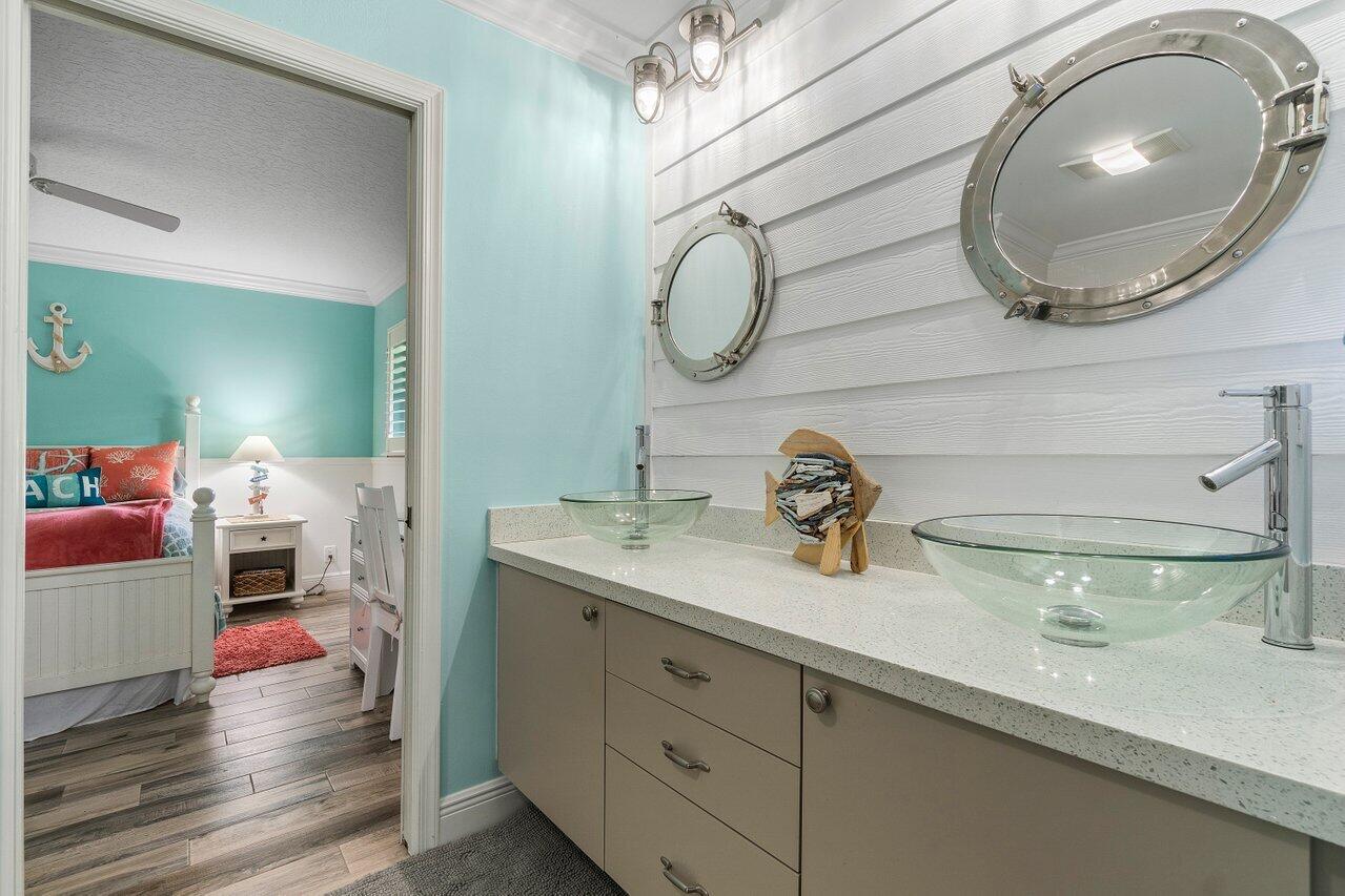 18779 Southeast River Ridge Road Tequesta, FL 33469 - Photo 26 of 62 Jack & Jill Bath