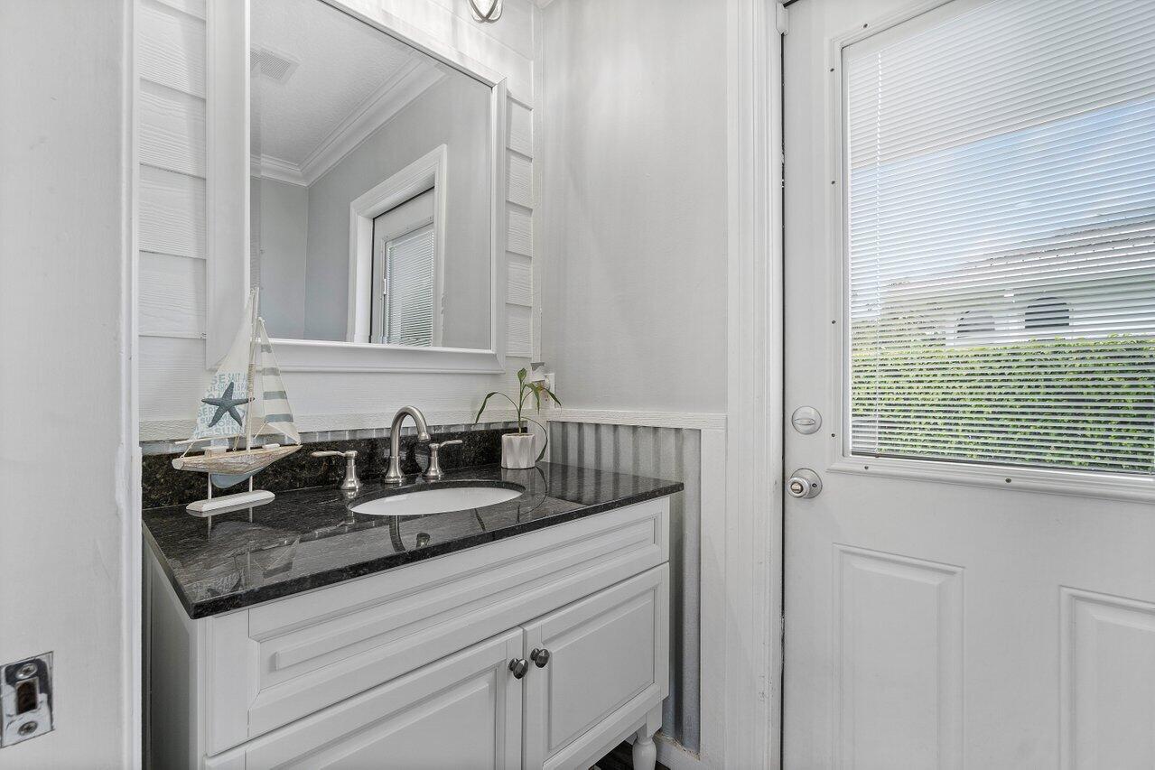 18779 Southeast River Ridge Road Tequesta, FL 33469 - Photo 29 of 62 Family Room Cabana Bath