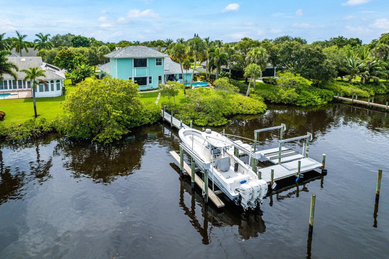 18779 Southeast River Ridge Road Tequesta, FL 33469 - Photo 36 of 62 Dock with 2 Lifts