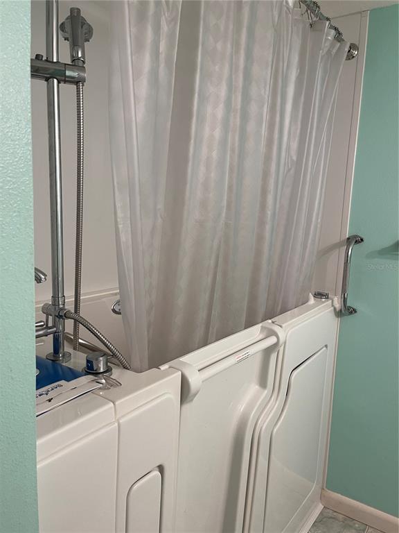 820 Virginia Street, Unit 207 Dunedin, FL 34698 - Photo 6 of 7 a close up of a curtain