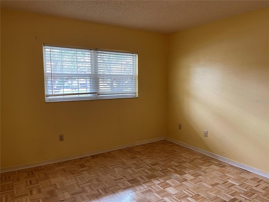820 Virginia Street, Unit 207 Dunedin, FL 34698 - Photo 7 of 7 a view of a room with a window