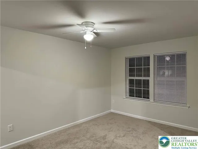 an empty room with window