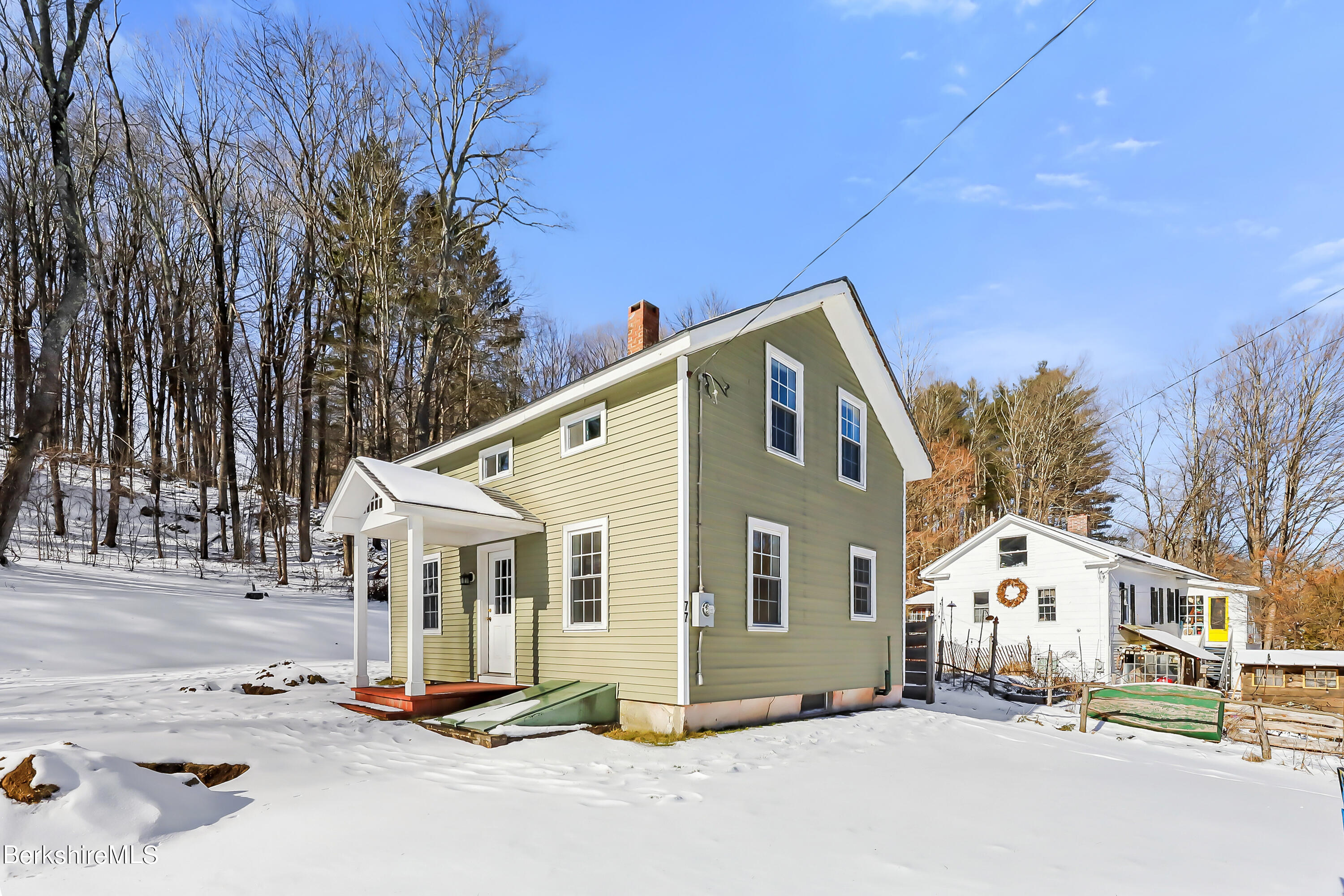 77 Clayton Mill River Road New Marlborough, MA 01244 - Photo 2 of 16 a view of a house with a patio