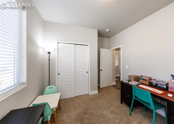 a bathroom with a toilet and a sink
