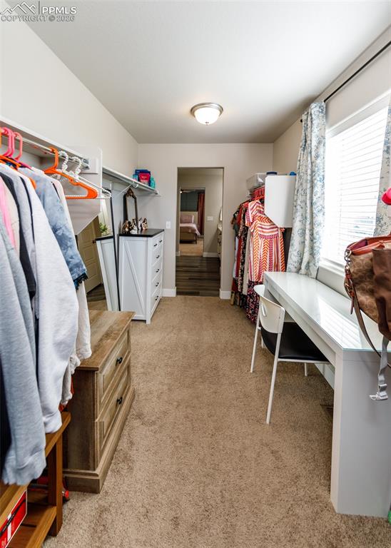 12653 Granite Ridge Drive Peyton, CO 80831 - Photo 36 of 50 a bedroom with furniture and a window