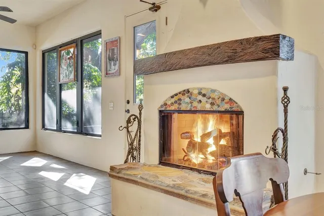 a view of a chairs and table in the patio
