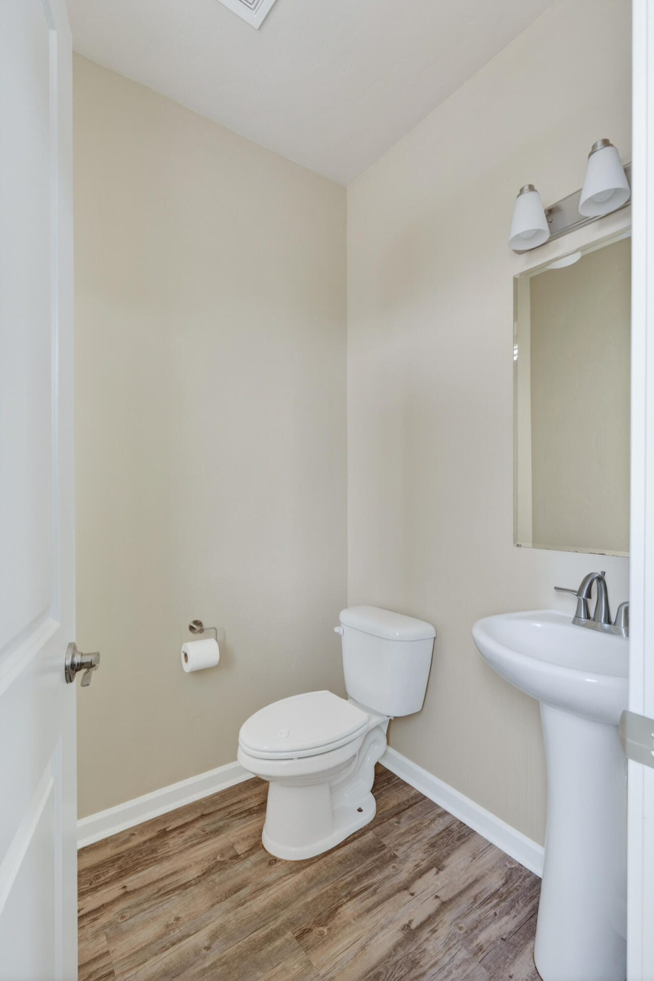 3365 Southwest 28th Street Redmond, OR 97756 - Photo 14 of 39 a white toilet sitting next to a bathroom sink