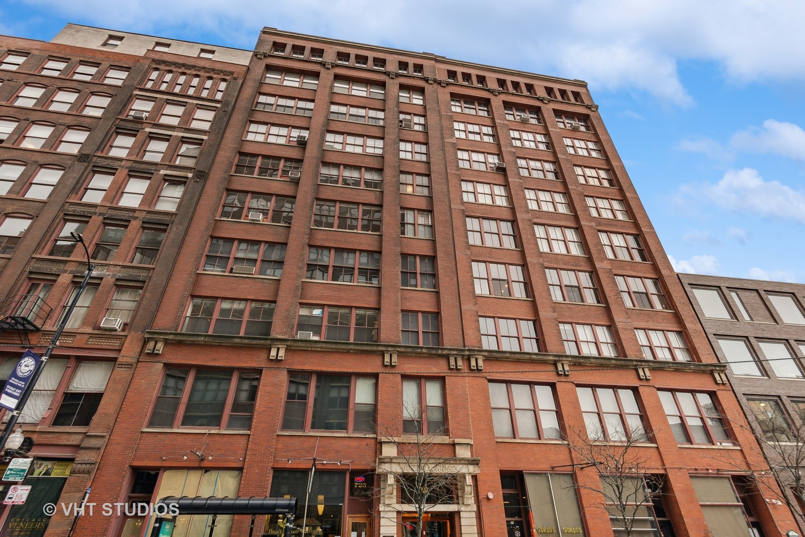 727 South Dearborn Street, Unit 211 Chicago, IL 60605 - Photo 2 of 34 front view of a building