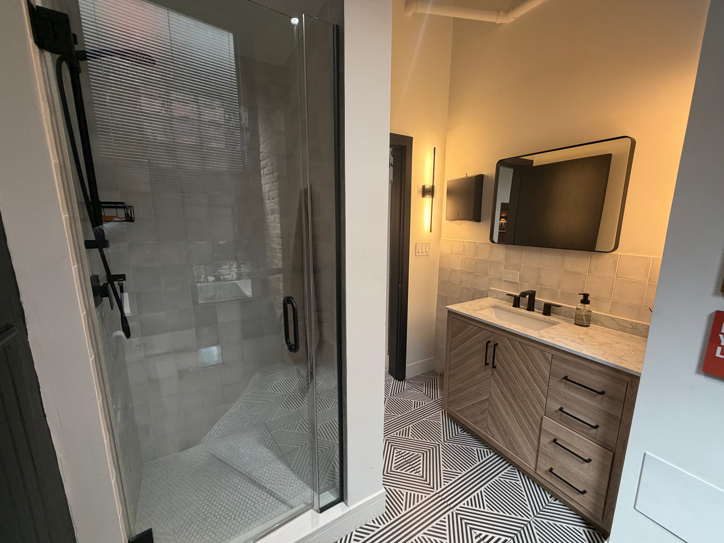 727 South Dearborn Street, Unit 211 Chicago, IL 60605 - Photo 28 of 34 a bathroom with a sink a toilet and shower