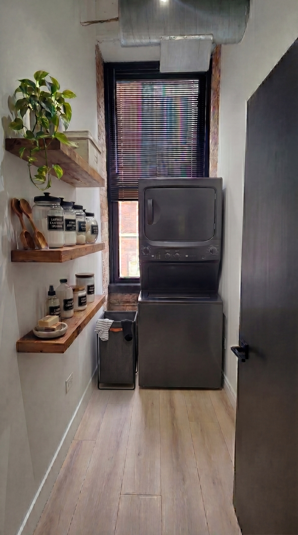 727 South Dearborn Street, Unit 211 Chicago, IL 60605 - Photo 31 of 34 a kitchen with a sink and cabinets