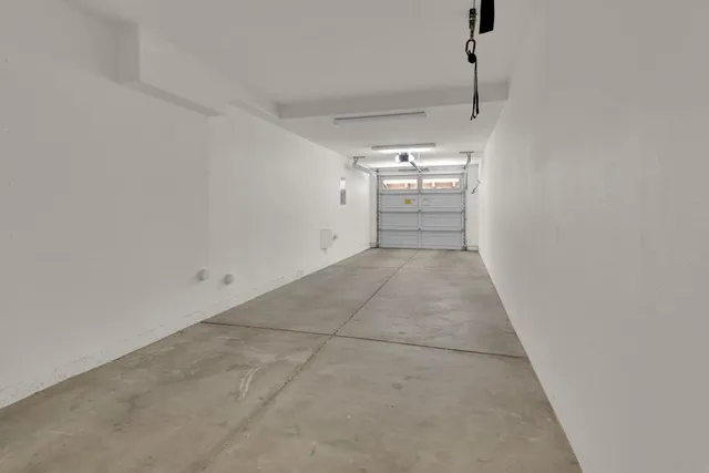 a view of a storage & utility room with a sink