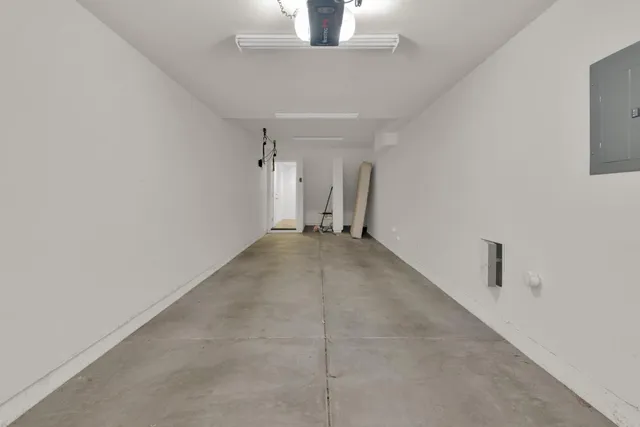 a view of a hallway with a chandelier
