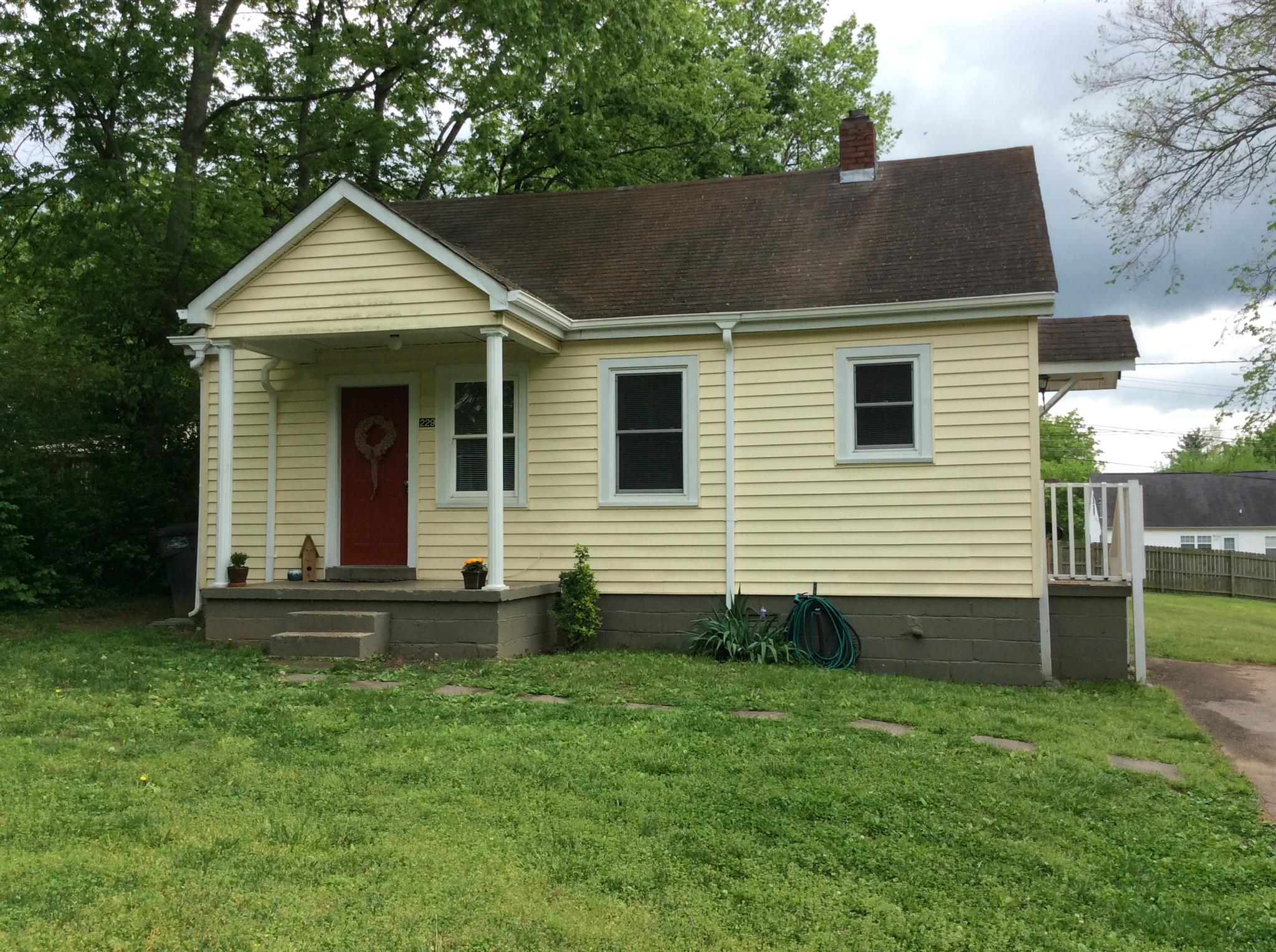 229 Mockingbird Drive Columbia, TN 38401 - Photo 2 of 8 a view of a house with a yard