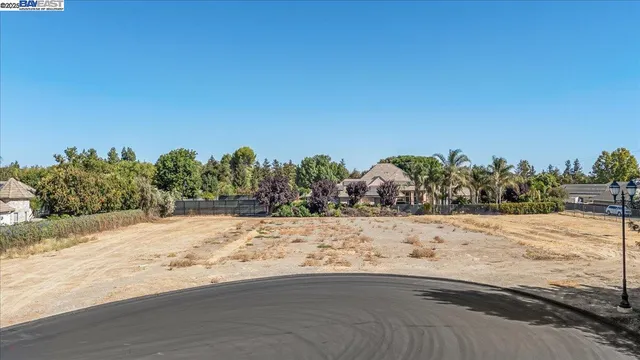 a view of ocean beach and mountain
