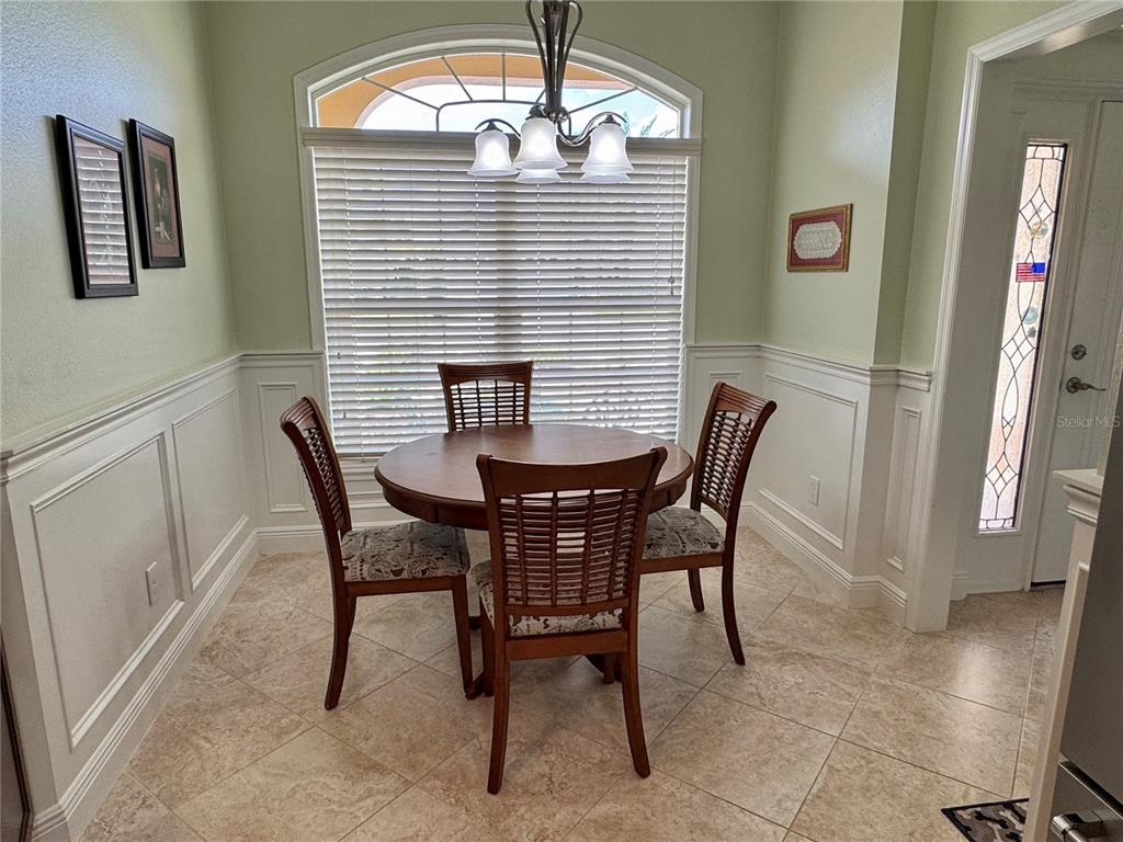 2005 Markridge Loop The Villages, FL 32162 - Photo 4 of 36 a view of a dining room with furniture and window