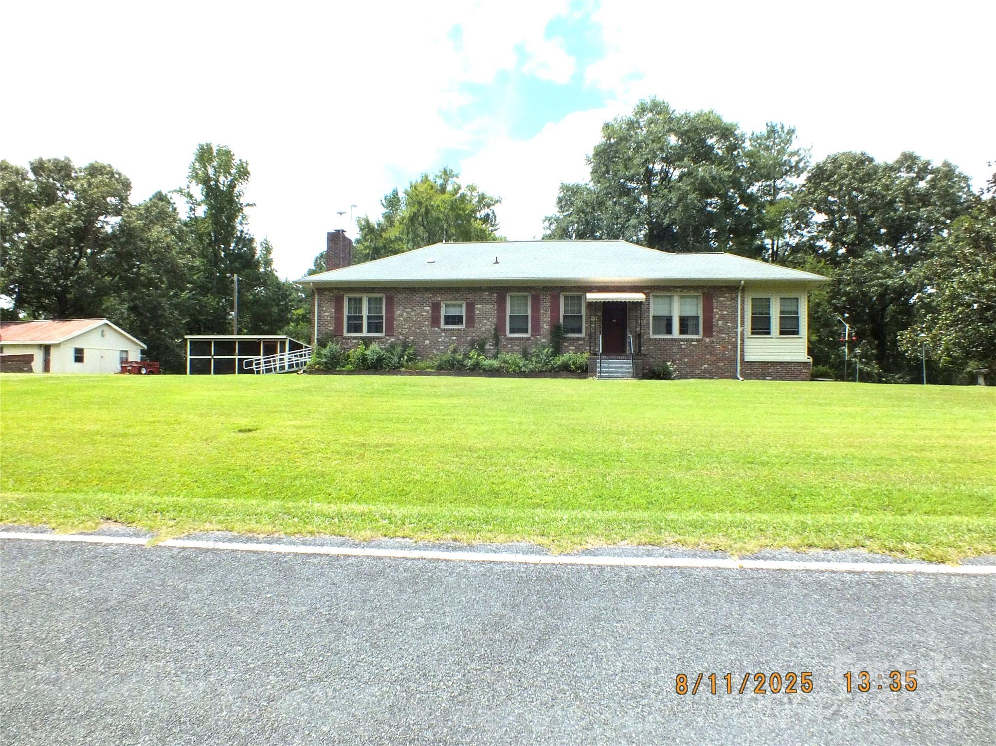 a view of a house with a swimming pool