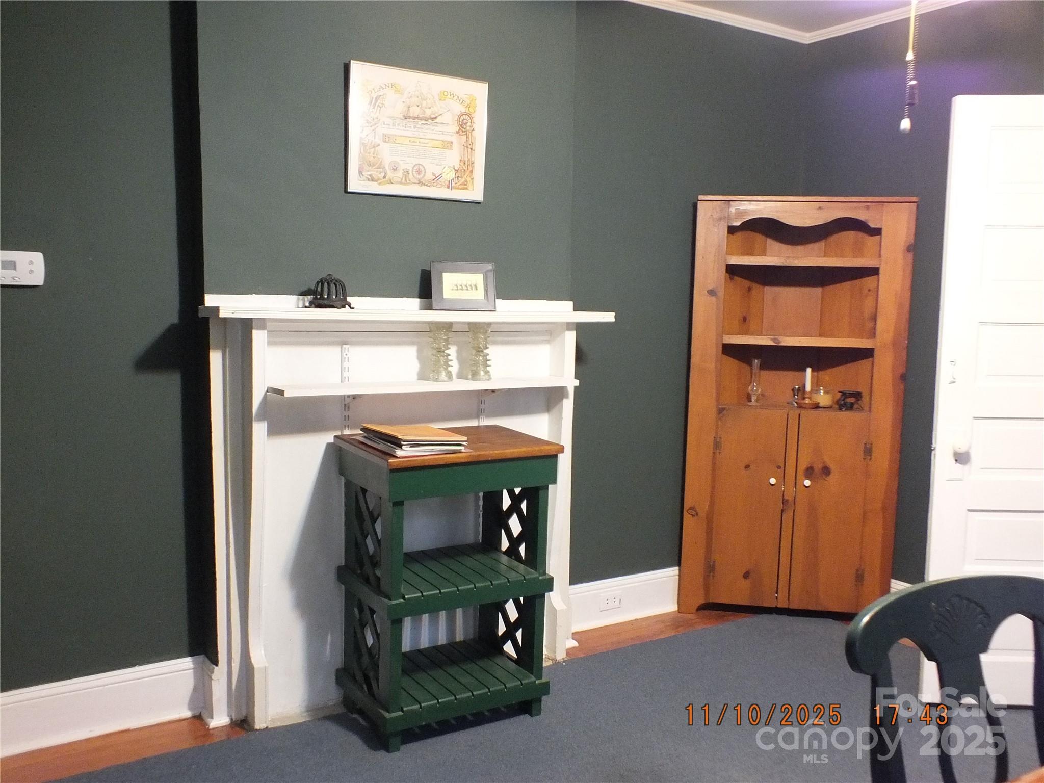 5034 State Rd S-29-20 Heath Springs, SC 29058 - Photo 12 of 43 a room with fireplace and cabinets