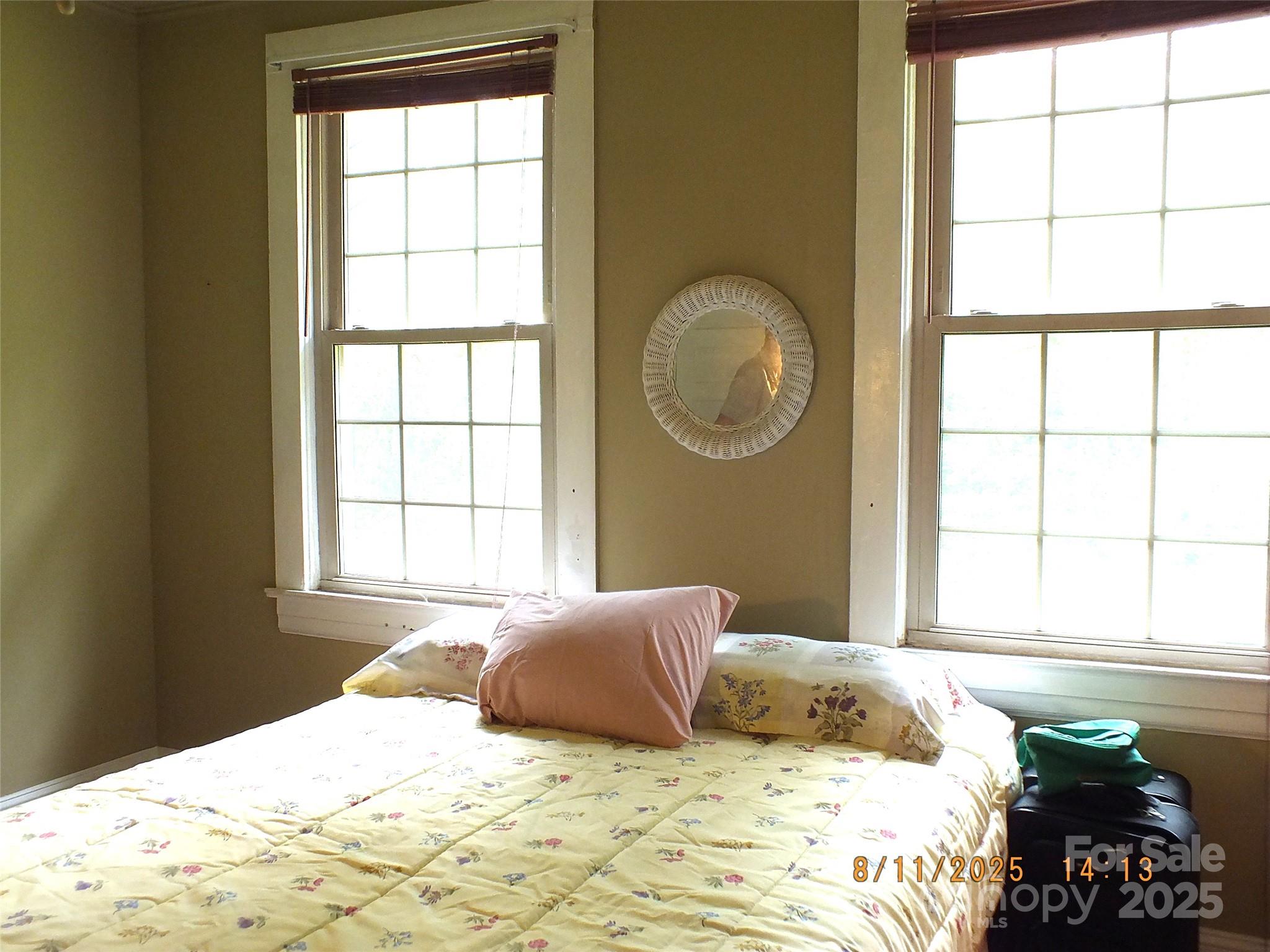 5034 State Rd S-29-20 Heath Springs, SC 29058 - Photo 17 of 43 a bedroom with a bed and a window