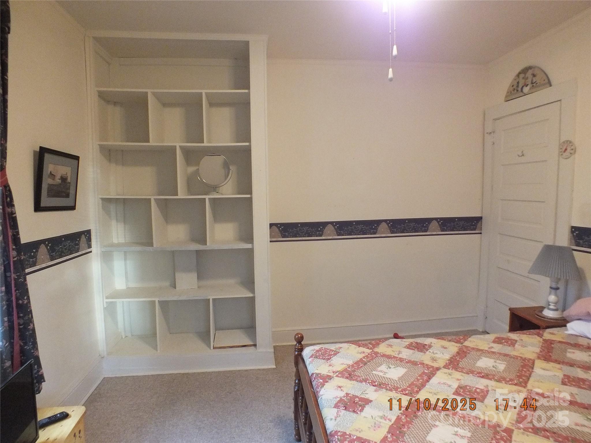 5034 State Rd S-29-20 Heath Springs, SC 29058 - Photo 20 of 43 a bedroom with a bed and cabinet