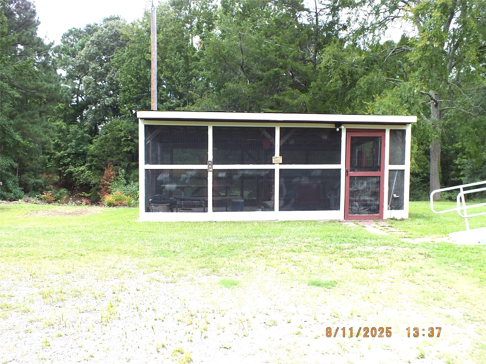 5034 State Rd S-29-20 Heath Springs, SC 29058 - Photo 2 of 43 a view of a large window with a house in the background