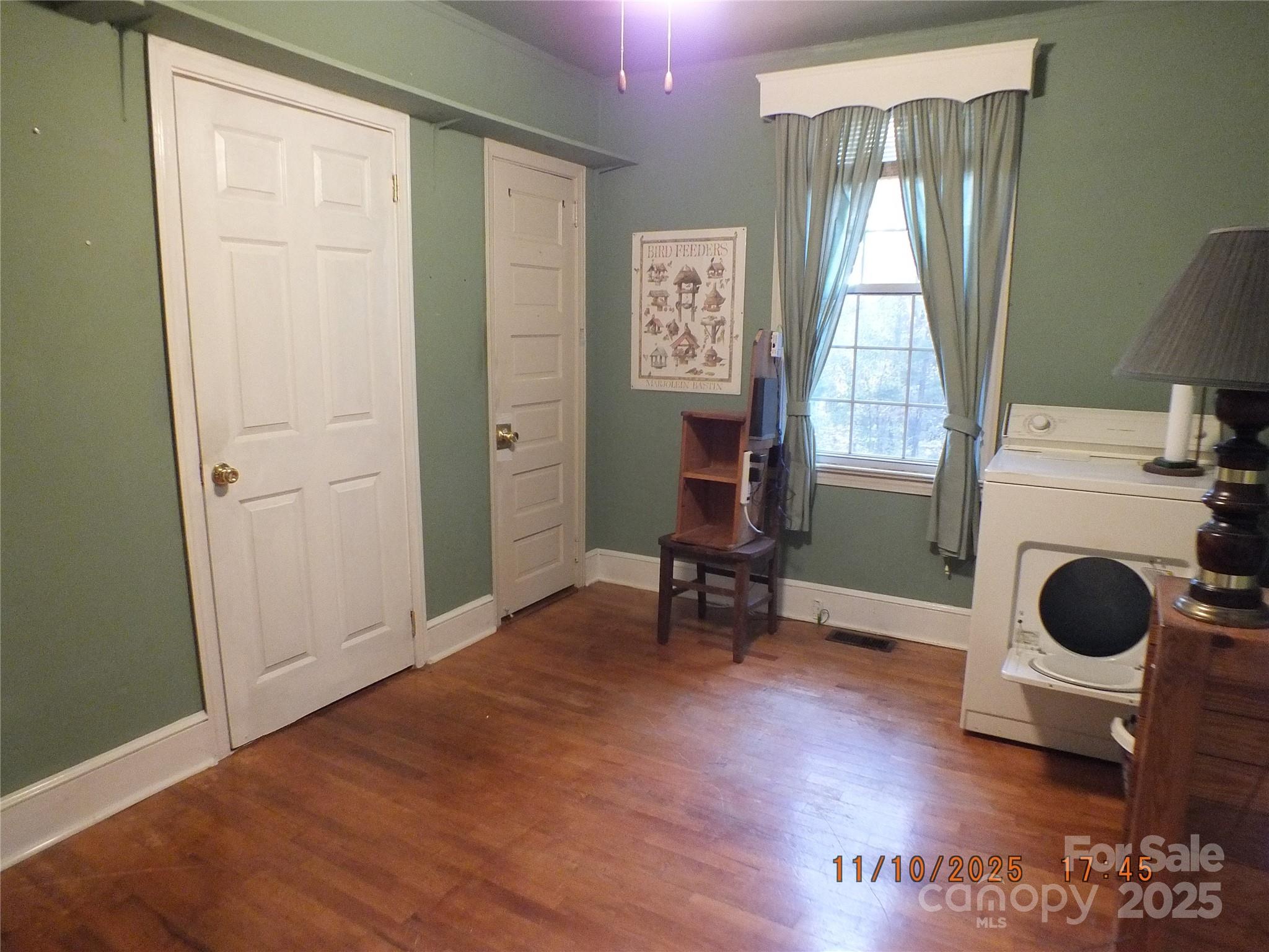 5034 State Rd S-29-20 Heath Springs, SC 29058 - Photo 22 of 43 a view of a room with wooden floor and a window