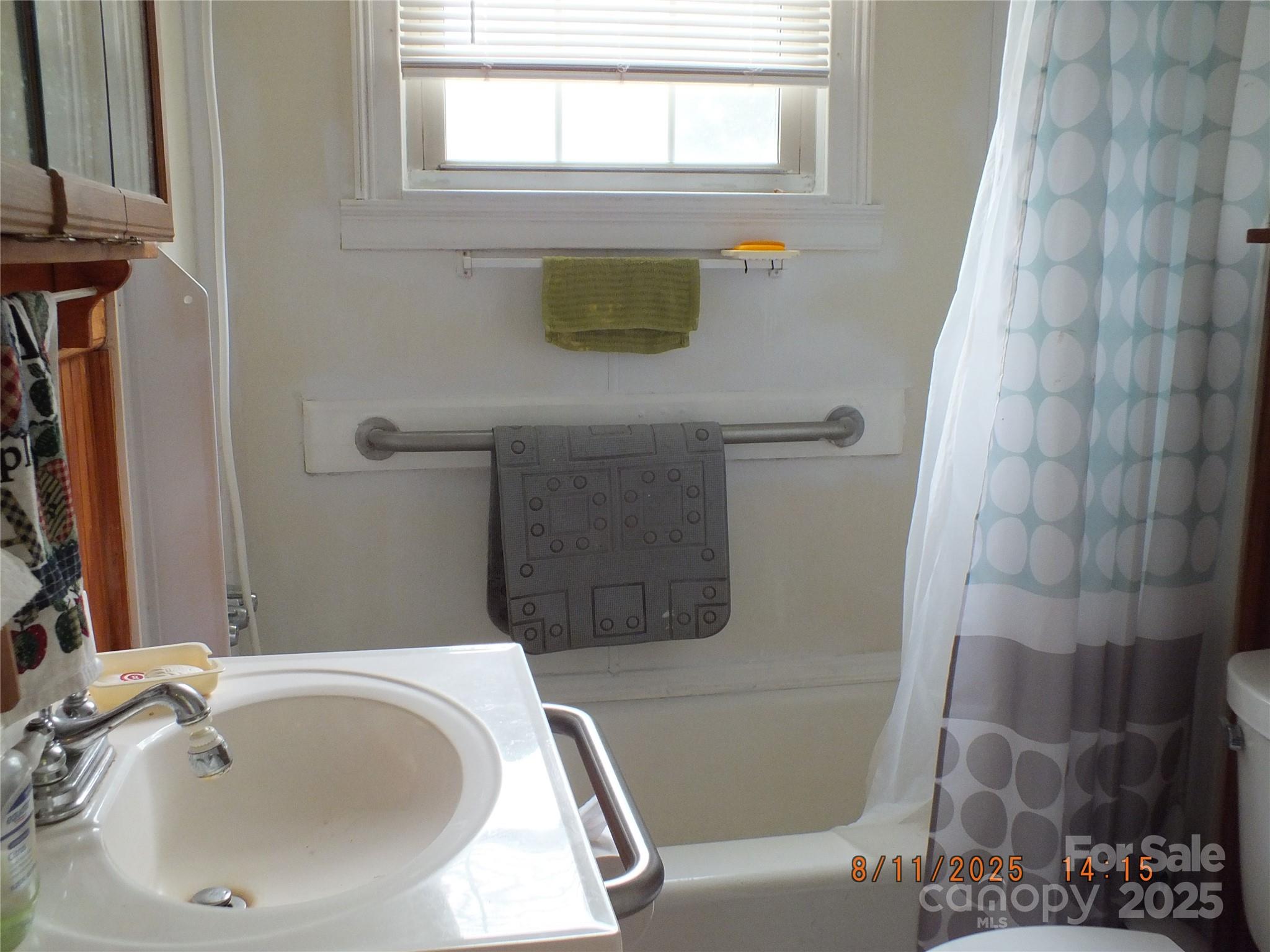 5034 State Rd S-29-20 Heath Springs, SC 29058 - Photo 25 of 43 a bathroom with a sink a toilet and shower