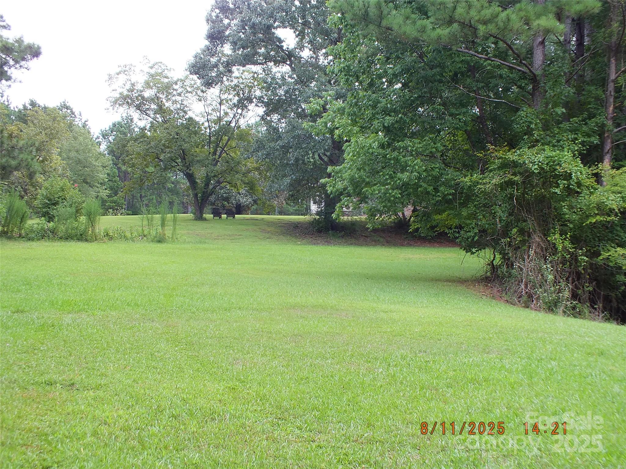 5034 State Rd S-29-20 Heath Springs, SC 29058 - Photo 30 of 43 a view of outdoor space with deck and green space