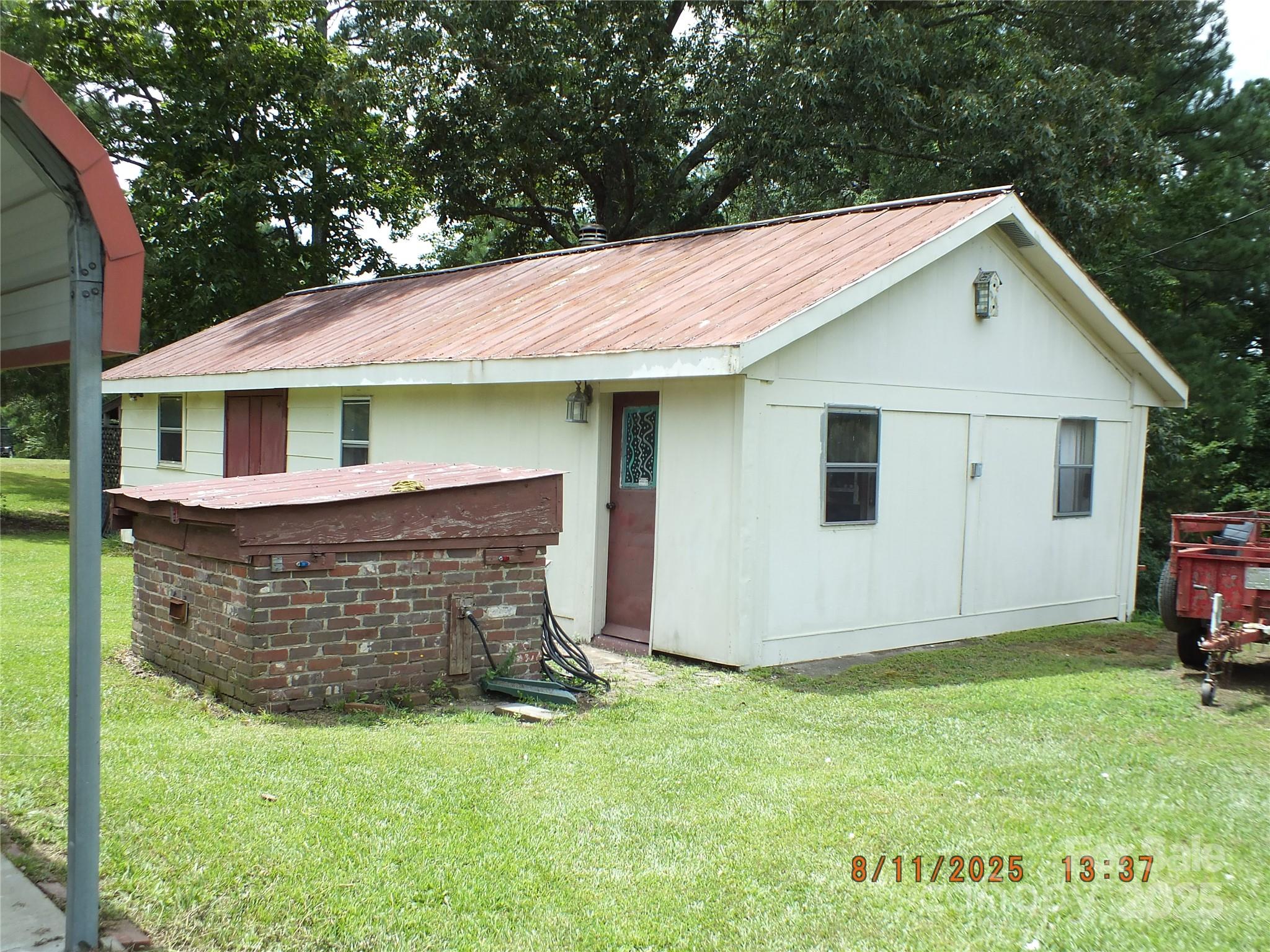 5034 State Rd S-29-20 Heath Springs, SC 29058 - Photo 3 of 43 a view of a house with backyard