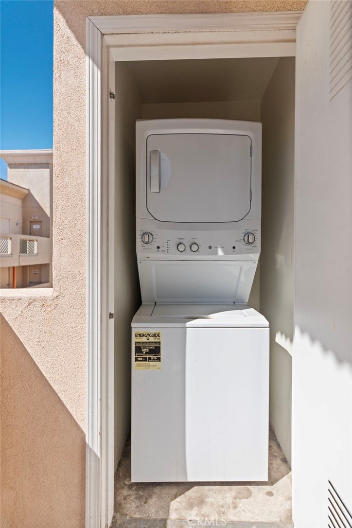 421 South Garfield Avenue, Unit 79 Monterey Park, CA 91754 - Photo 15 of 23 a utility room with dryer and washer