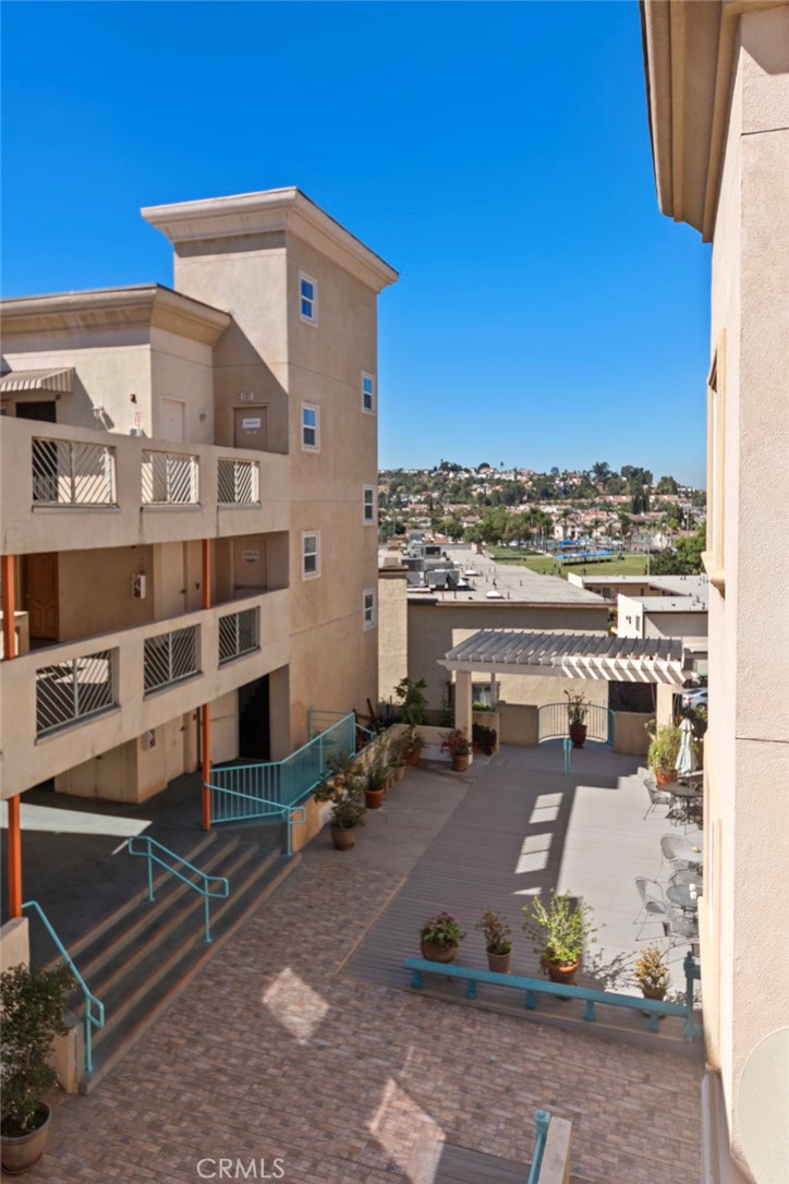 421 South Garfield Avenue, Unit 79 Monterey Park, CA 91754 - Photo 19 of 23 a large building with a view of the ocean