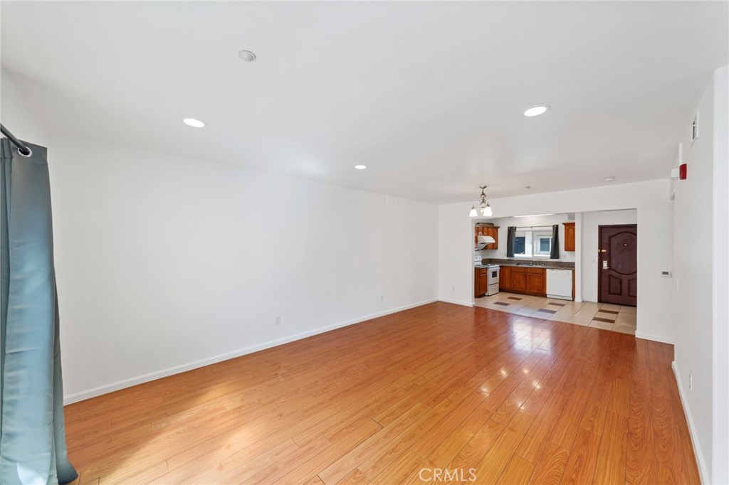 421 South Garfield Avenue, Unit 79 Monterey Park, CA 91754 - Photo 3 of 23 a view of empty room with wooden floor