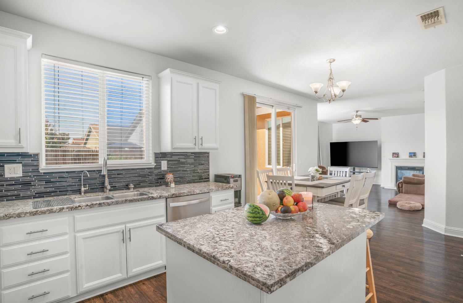3815 Lee Brook Way Sacramento, CA 95838 - Photo 12 of 43 a kitchen with sink stove and cabinets