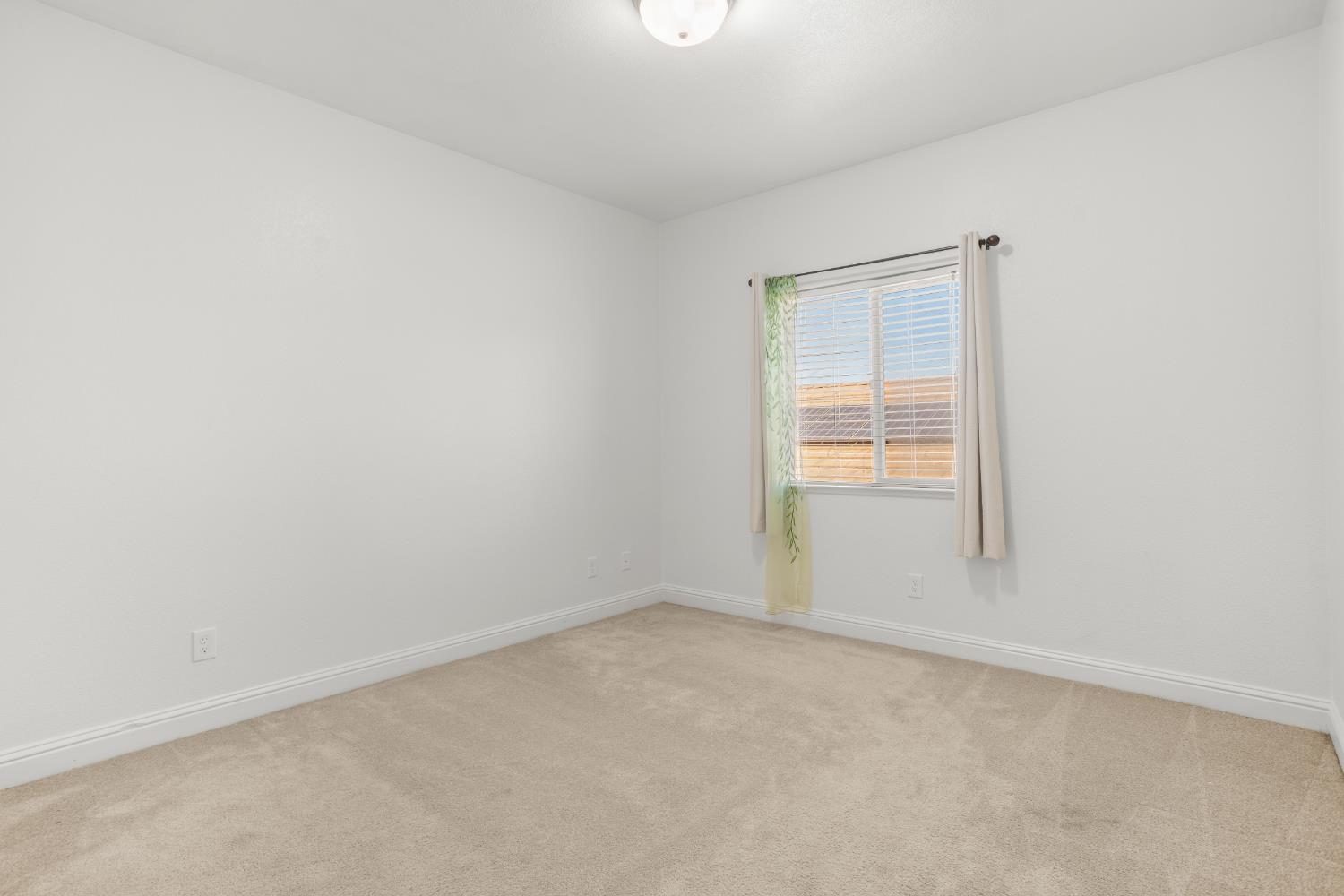 3815 Lee Brook Way Sacramento, CA 95838 - Photo 38 of 43 a view of an empty room with a window