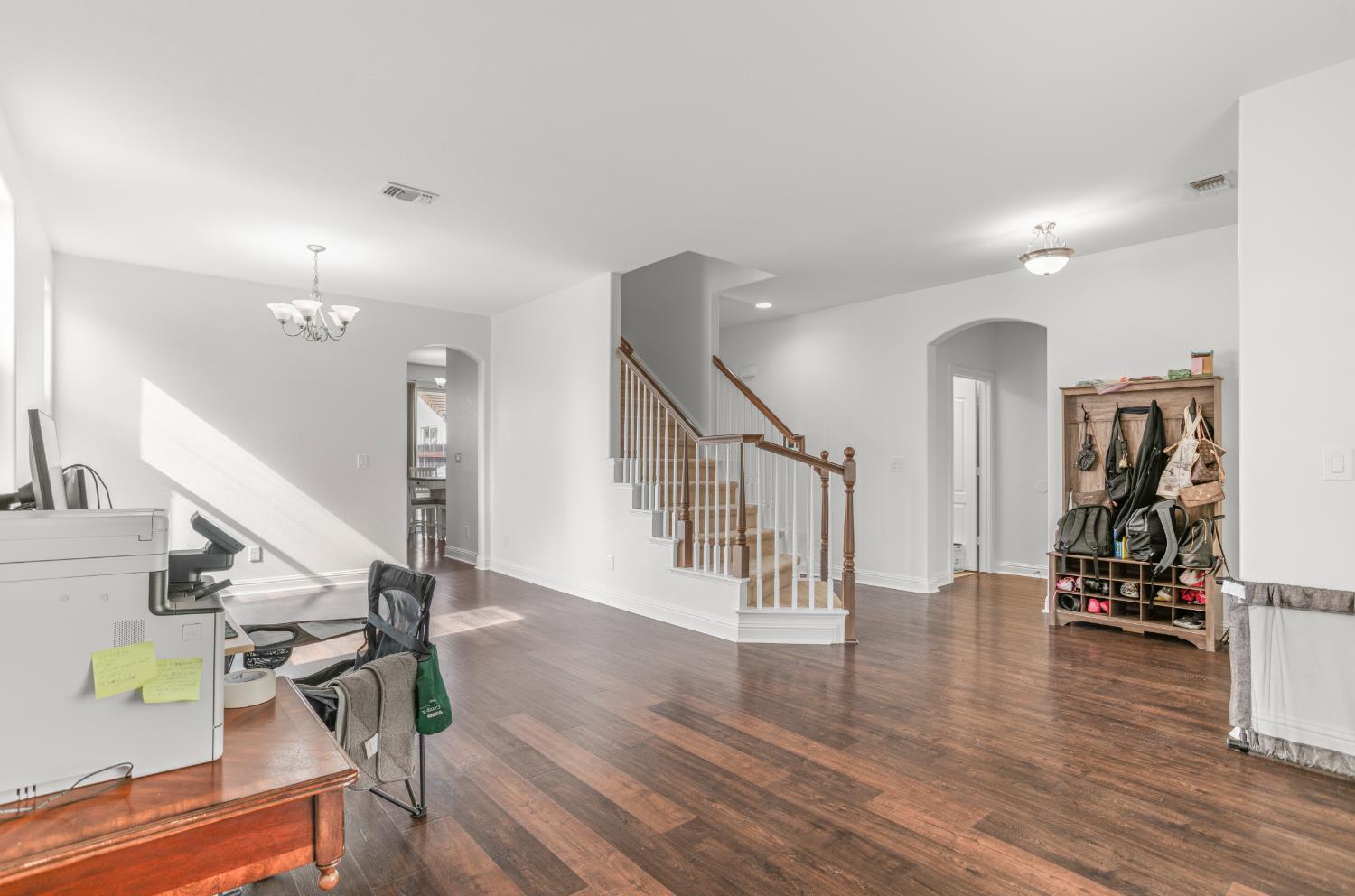 3815 Lee Brook Way Sacramento, CA 95838 - Photo 5 of 43 a view of entryway and hall with wooden floor