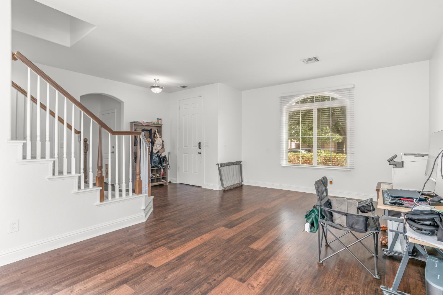 3815 Lee Brook Way Sacramento, CA 95838 - Photo 6 of 43 a view of a livingroom with wooden floor and a window