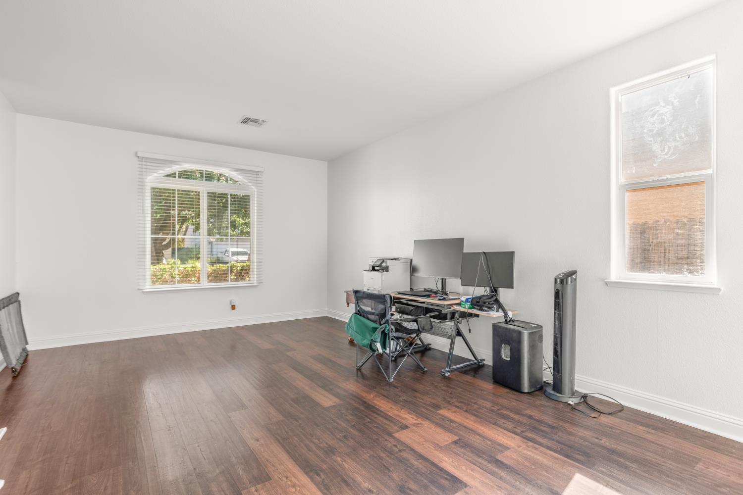 3815 Lee Brook Way Sacramento, CA 95838 - Photo 7 of 43 a view of a workspace with furniture and a window