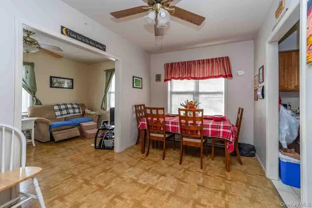 a view of a livingroom with furniture window and outside view