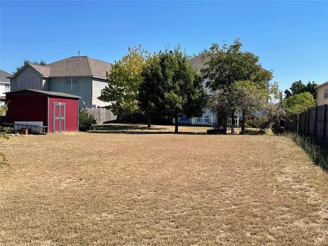 a view of door with yard
