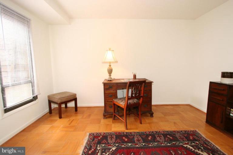 5235 West Running Brook Road, Unit 301 Columbia, MD 21044 - Photo 8 of 22 a workspace with furniture and window